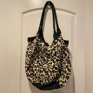 Tillys Black and Tan purse.